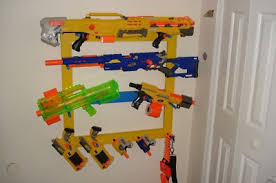 Blaster, clip, 20 darts, and instructions. Nerf Gun Rack Storage For Up To 9 Rifles And Pistols 137817782
