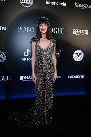 sheer spiderweb gown on the red carpet