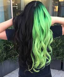 Half and half hair coloring! The Half And Half Hair Color Trend Aka Two Tone Hair Is Perfect For Spring Fashionisers C Hair Styles Perfect Hair Color Cool Hair Color