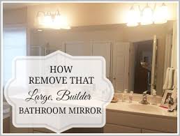 remove a large bathroom builder mirror