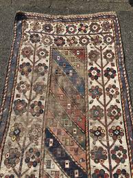 antique caucasian rug from an old