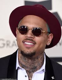 Chris brown tattoos rihanna's face on. Chris Brown Gets More Tattoos On His Neck As He Snoozes While Getting Needled Daily Mail Online