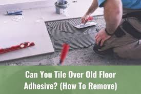 Laminate is a cheap, fast flooring solution that easily goes right over ceramic tile. Can You Should You Tile Over Old Floor Adhesive How To Remove Ready To Diy