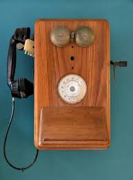 Vintage Telephone Hanging On A Wall