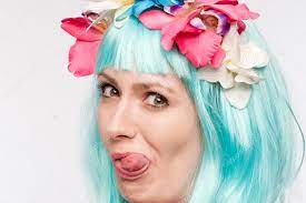 crazy wig tongue out stock photo