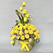 yellow rose in jute basket dp saini