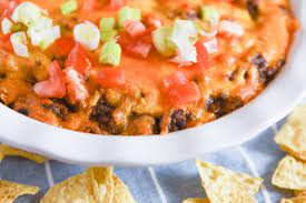 layered mexican taco dip with ground beef