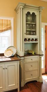 white kitchen cabinets with glass doors