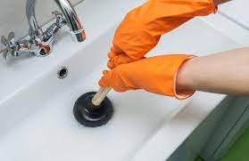 a plunger to unclog a toilet sink