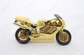 Miniature Gold Bike Stock Photo, Picture And Royalty Free Image. Image  11997680.