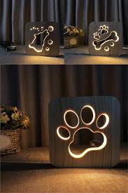 Choose your favorite dog designs and purchase them as wall art, home decor, phone cases, tote bags, and more! Wooden Dog Themed Lamp Dog Home Decor Dog Themed Dog Paws
