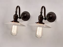 pair of antique single arm sconces with