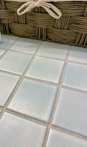 Penny tiles are making a comeback in the contemporary tile world. Matching Flooring To Light Blue Bathroom Tile Countertop