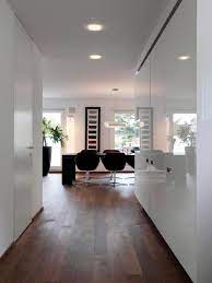 the white walls and wooden floor