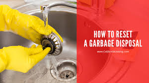how to reset a garbage disposal