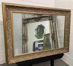large antique gold framed mirror ornate