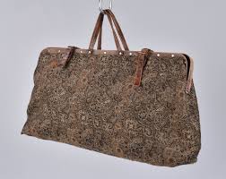 carpet bag with leather handles for