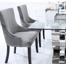 These camden dining chairs have padded grey velvet upholstery, silver studs around the edging and a stunning chrome knocker that cradles the back. Grey Velvet Chair With Knocker And Diamond Back Wow Interiors