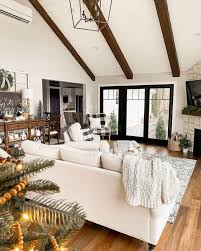 white vaulted ceilings with wood beams