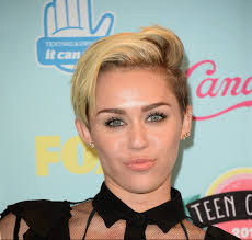 miley cyrus wears wedding bands to