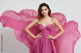 woman in pink gown flowing fabric