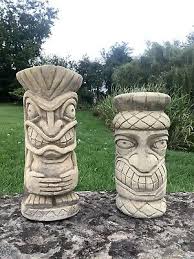 stone garden pair of totem poles
