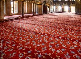 prayer area covered with red carpets
