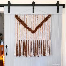 Easy Wall Hanging From A Rug And Yarn