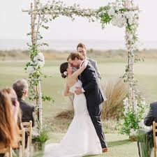 Draped on it is chiffon fabric that sways to the breeze. 38 Wooden Wedding Arch Ideas