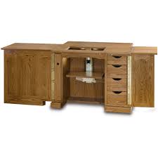 extendable sewing machine cabinet with
