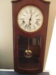 Vintage Wooden Chiming Wall Clock With