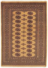 bokhara rug by asiatic carpets in gold