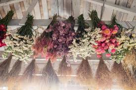 Hanging flower ceiling over marquee dancefloor. Discovering Dried Flowers Floret Flowers