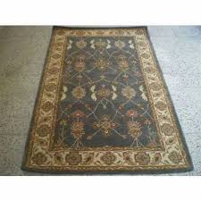 golden hand knotted woolen carpets at