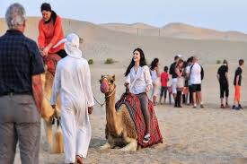 camel trekking abu dhabi adventures