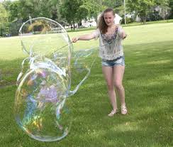get outside to make giant dish soap bubbles