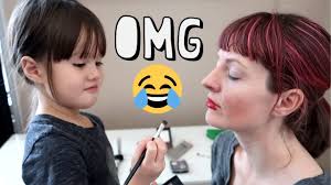 makeup kid doing goth makeup tutorial