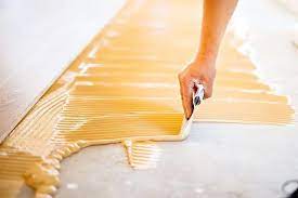 how to glue hardwood floors step by