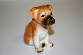 boxer puppy figurine background object
