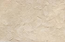 Plastering is a process by which coarse surfaces of wall or ceiling roofs are changed or turned or rendered to provide smoothness. Exterior Wall Covering Patching Stucco On The House