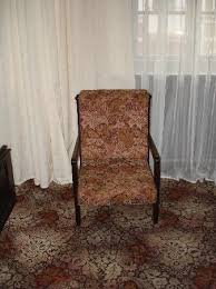 high backed chairs and the ugly carpet