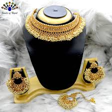 kundan stones studded high gold