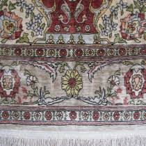 fine silk hereke rug with signature