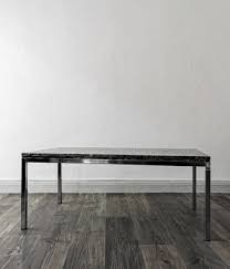 mid century coffee table in chrome and