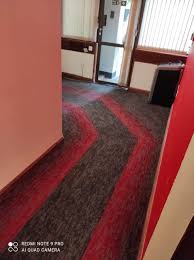 charmine in red carpet tiles contract