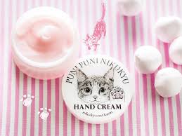 cat with hand cream scented