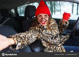 funny woman in a fur coat and red hat
