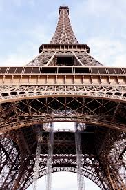 climb the eiffel tower in paris france