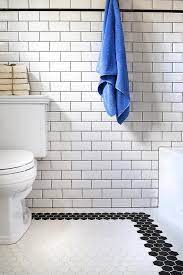 white hex tiles with black grout design