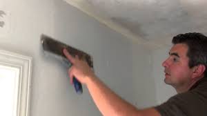 how to apply a skim coat on walls you